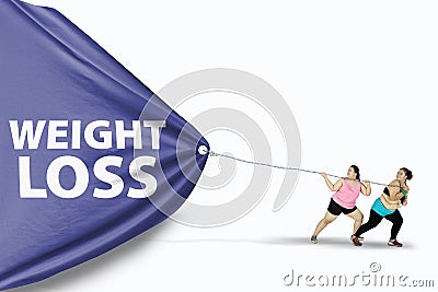 Overweight women draw Weight Loss text Stock Photo