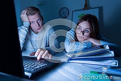 Overwork people working at night Stock Photo