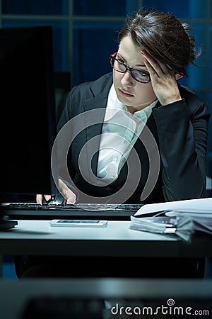 Overworked businesswoman having problem Stock Photo