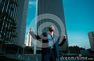 Overworked excited businessman. Hard business at work office outdoor. Stock Photo