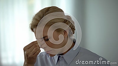 Overworked female manager feeling eye pain, visual impairment, health care Stock Photo