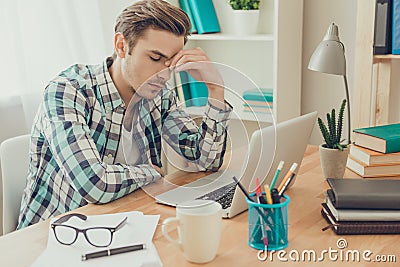 Overworked sick man in bad mood thinking about task Stock Photo