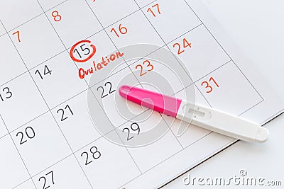 Ovulation day mark in calendar with ovulation home test Stock Photo