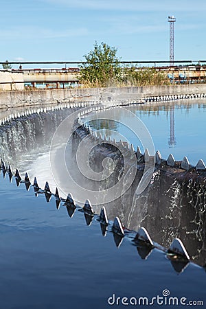 Owerflowing sewage from radial sedimentation tank Stock Photo
