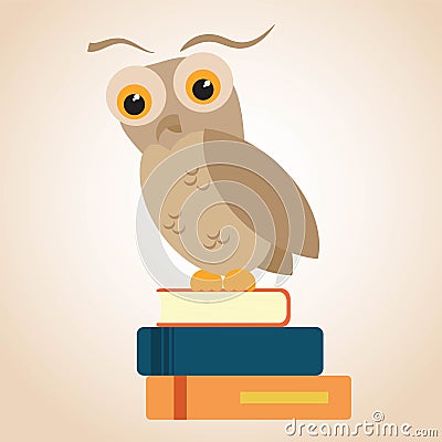Owl on a pile of books Stock Photo