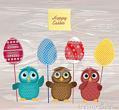 Owls keep Easter decorated eggs on a stick. Multicolored. Empty Stock Photo