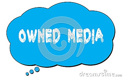 OWNED MEDIA text written on a blue thought bubble Stock Photo