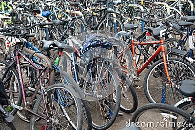 OXFORD, ENGLAND - FEBRUARY 18 2023: Bicycles in racks, eco friendly local transportation. Editorial Stock Photo