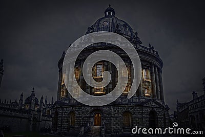 Oxford UK - Radcliffe Camera - Monumental circular domed library opened in 1749 - Night scene with lights in windows Editorial Stock Photo