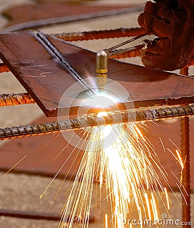 Oxygen and acetylene torch cutting steel Stock Photo