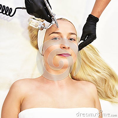 Oxygen mesotherapy. Anti-aging beauty treatment using hyaluronic acid. Stock Photo