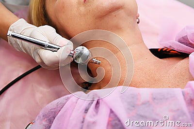 Oxygen mesotherapy. Anti-aging beauty treatment using hyaluronic acid. Stock Photo