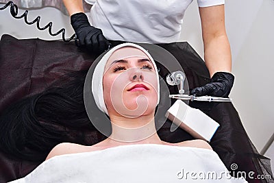 Oxygen mesotherapy. Anti-aging beauty treatment using hyaluronic acid. Stock Photo