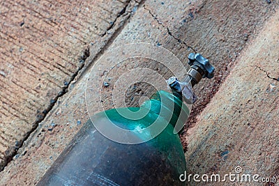 Oxygen tank industry medical safety value. Welding cylinder with gas. Repair work on the street. Compressed gas argon or carbon d Stock Photo