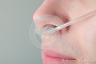 Oxygen tube in the patient's nose Stock Photo