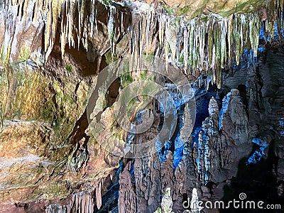 Oylat Cave, mobile photography of a beautiful long cave in the darkness, stalactites and stalagmites Editorial Stock Photo