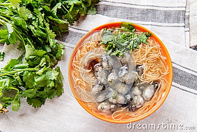 Oyster vermicelli is a delicious food in Taiwan. It is made with oysters and thin noodles Stock Photo