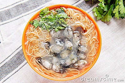 Oyster vermicelli is a delicious food in Taiwan. It is made with oysters and thin noodles Stock Photo