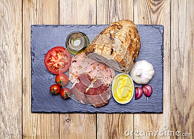 Pa amb tomata (bread with tomato), ham and all-i-oli (garlic and Stock Photo