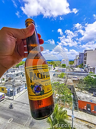 Pacifico beer bottle cityscape caribbean beach panorama Playa del Carmen Editorial Stock Photo