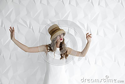 Pacified Woman in Straw Hat Stock Photo
