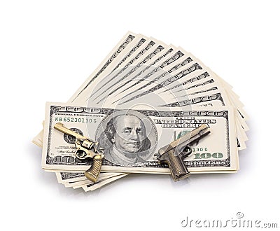 Pack of dollars and weapon Stock Photo