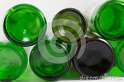 Pack of empty beer and wine green and brown glass bottom bottles, on a white background. Reuse, Eco-Friendly Stock Photo