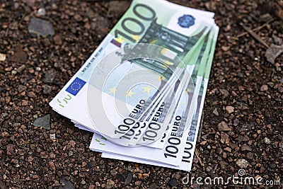 a pack of euros is lying on the ground. loss of money Stock Photo