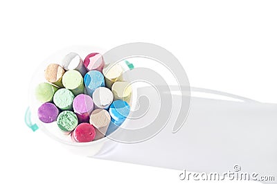 Pack of Jumbo Sidewalk Chalk, Assorted Colors in a Plastic Bucket on White Background with Shadow. Top View Stock Photo