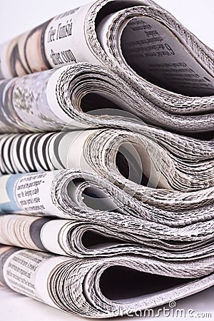 Pack of newspapers taken on white background Editorial Stock Photo