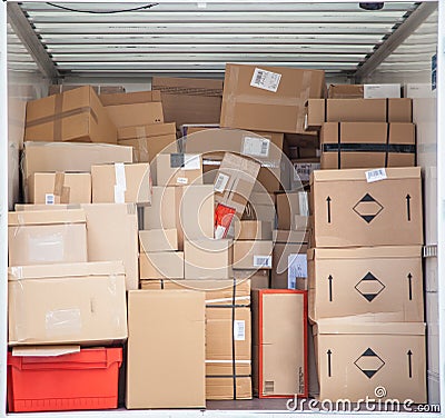 Packages in delivery truck Stock Photo