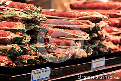 Packed sausage packages stacked in the BoquerÃ­a market, Barcelona Stock Photo