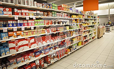 Packs of coffee. Shelves an Italian supermarket. Editorial Stock Photo
