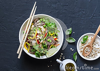 Pad Thai vegetables soba noodles on dark background, top view. Healthy vegetarian food Stock Photo