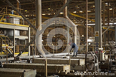 Zinc mine, Engineer control of machine in factory. Editorial Stock Photo