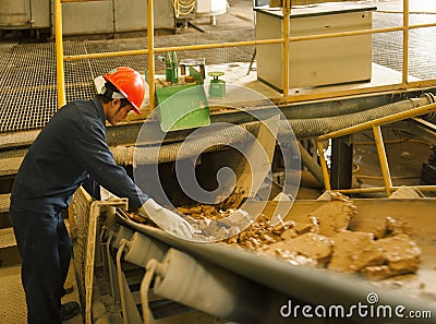 Zinc mine. Engineer quality check minerals. Editorial Stock Photo