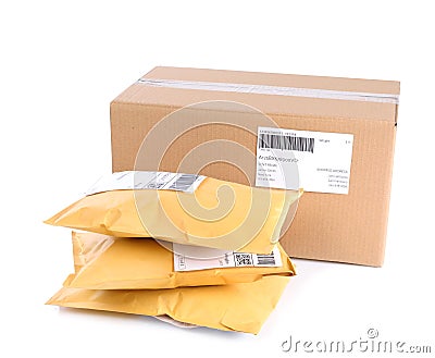 Padded envelopes and cardboard parcel Stock Photo