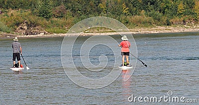 Paddle Boarders On The North Saskatchewan River Editorial Stock Photo