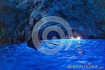 Paddle boat in the Blue Grotto Editorial Stock Photo