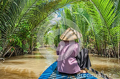 Paddling in the Mekong delta Stock Photo