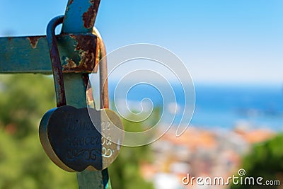 A padlock against the sea Stock Photo