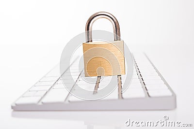 Padlock on black keyboard isolated on white background. Internet data privacy information security concept with free space Stock Photo