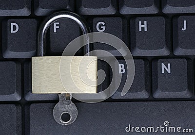 Padlock On Black Laptop Keyboard Stock Photo