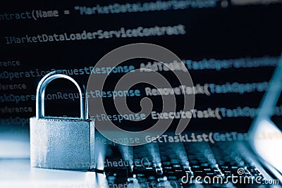 Padlock on laptop with a programming language. Internet data privacy information security concept. Antivirus and malware defense Stock Photo