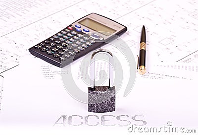 Padlock, pen, calculator Stock Photo