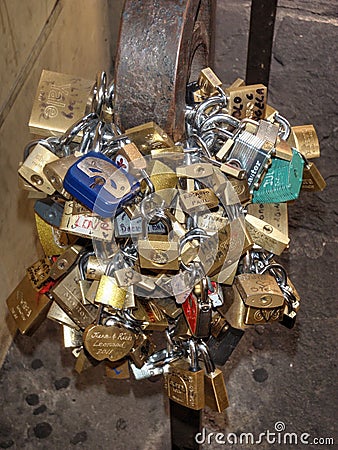 Padlocks Love chained to a bridge Editorial Stock Photo