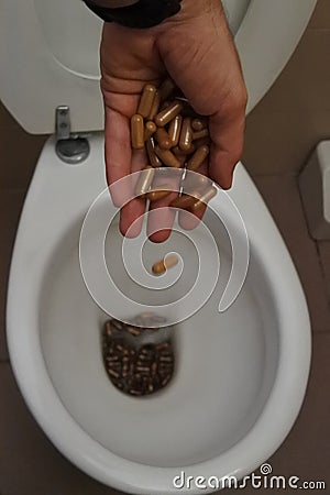 pads thrown into the toilet Stock Photo