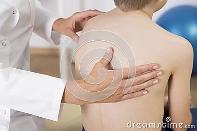 Paediatric scoliosis examination Stock Photo