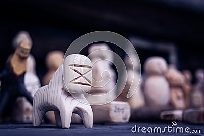 Pagan statuette made of wood rune Stock Photo