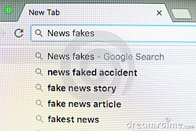 Page of internet browser with words NEWS FAKES in search bar, closeup Stock Photo